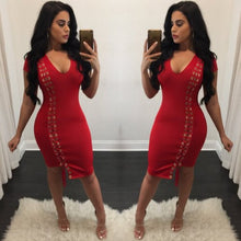 Red strapped lace up dress